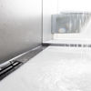 The shower channel with surface-guided single-point drainage offers versatile design and is particularly hygienic.