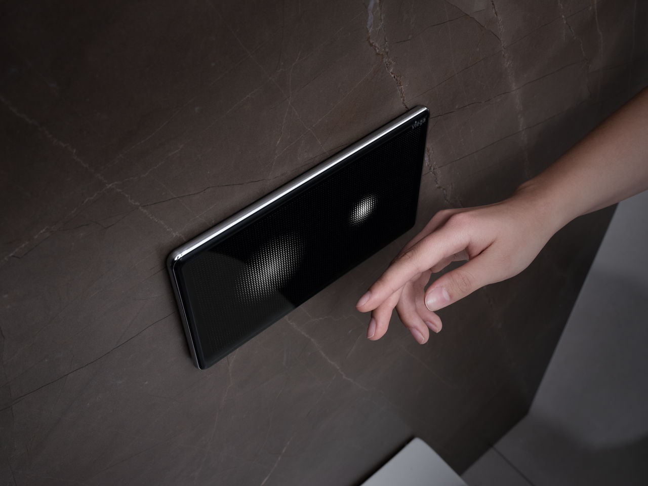 Visign for Care actuating panel: Programming takes place with a magnetic key.
