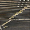 Suspended piping system mounted beneath concrete slab using press fittings for efficient installation