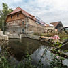 Die ehemalige Klostermühle Thurau an der Schwarzach wird mit viel Engagement restauriert.  (Foto: Viega)