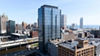 High-rise construction site with new floors being built rapidly on tight project schedule
