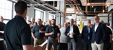 Image of people listening to speech at the opening ceremony of the VEC in NYC 