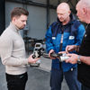 Fachlicher Austausch auf der Zeche Hansa zwischen Viega Key Account Manager Peter Drehsen (re.), Dennis Timmers (li., Teamleiter) und Frank Abel (Baustellenleiter; beide IVT GmbH Weiner + Reimann GmbH) zum Pressverbindersystem Sanpress Inox und zu den kompakten Pressmaschinen Pressgun 6. Mit ihnen kann selbst unter beengten Platzverhältnissen einfach installiert werden.