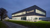 Image of the newest Viega World building at night