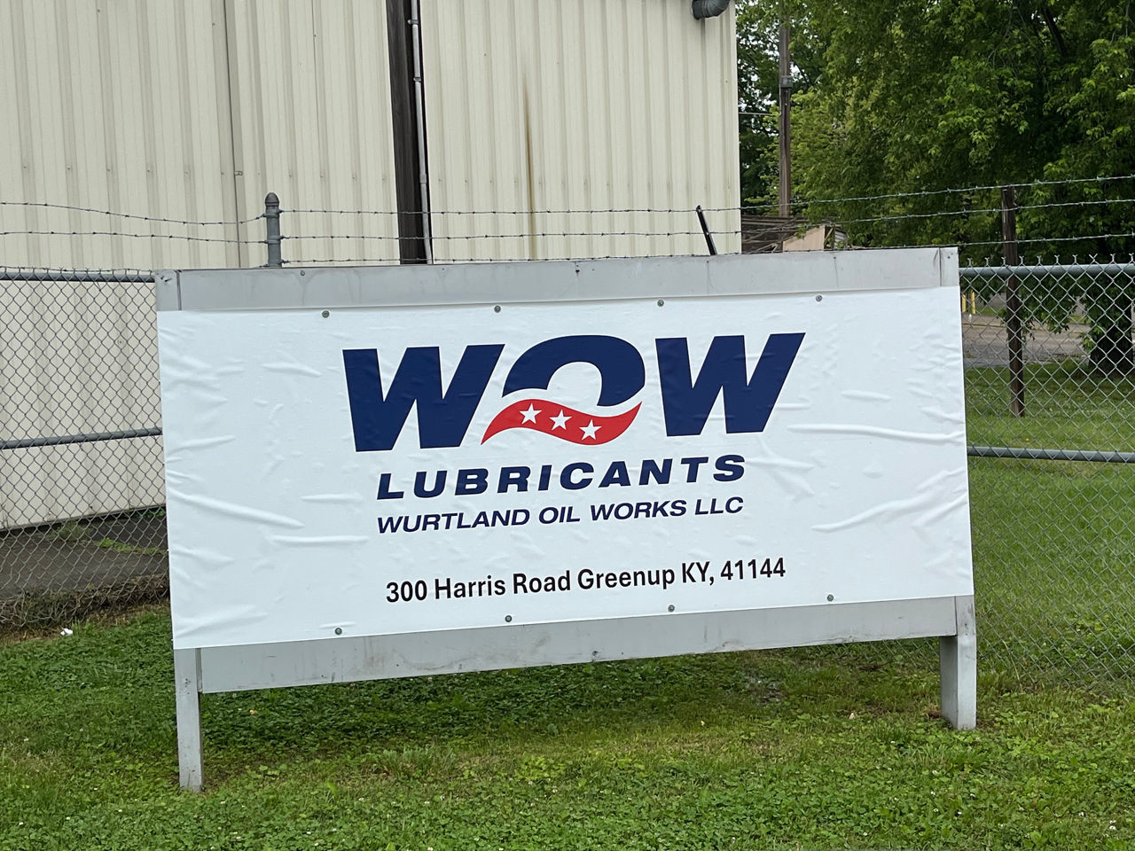 WOW Lubricants facility sign with logo and address at Kentucky production plant