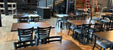 Jackass Brewing Company taproom and brewing facility featuring modern piping systems and beer production equipment