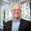 Porträtfoto von Axel Busch, dem CCO von Viega.