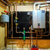 Boiler room piping system supporting hydronic heating in residential home
