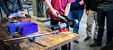 Students training in plumbing program using press technology through Viega Trades Education Network