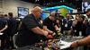 Participants competing in Viega skills challenge using press fittings during AHR Expo event