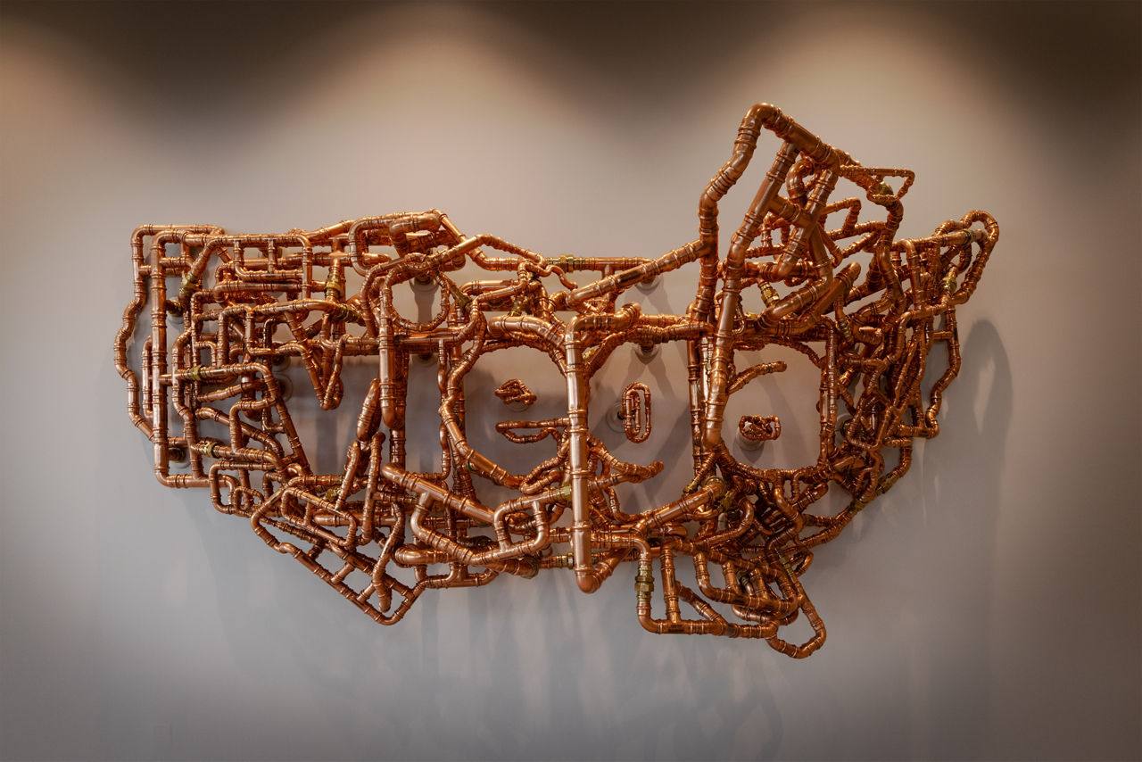Viega art piece made out of copper pipes